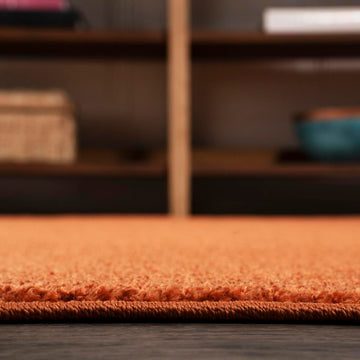 Haze Solid Low-pile Area Rug Orange